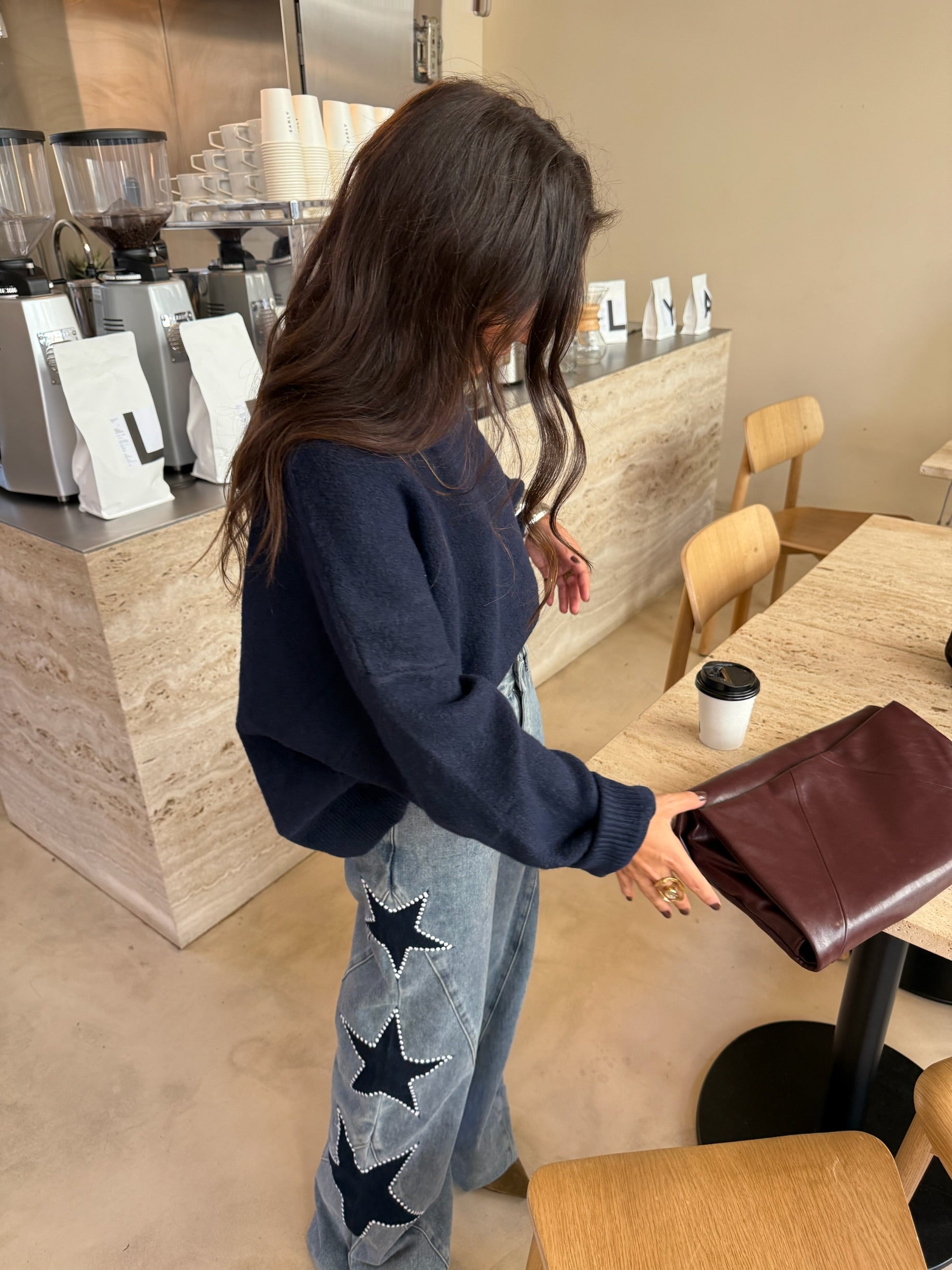 Jeans con stelle ricamate