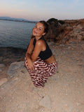 velmara-34 · pantaloni-fluidi-con-stampa-animalier · 71016889024849