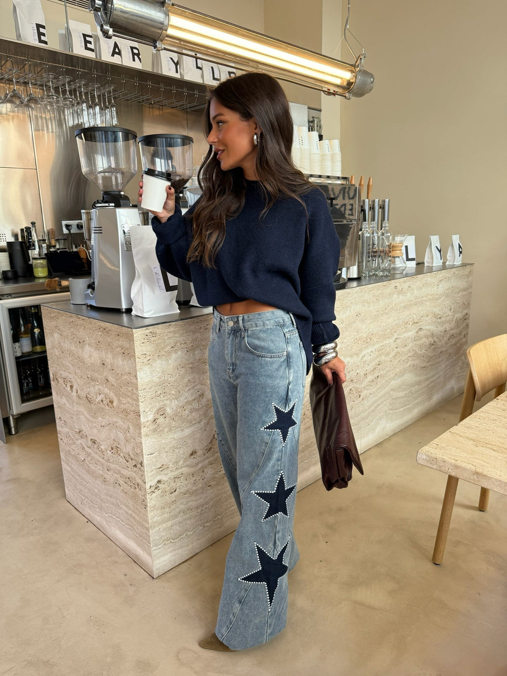 Jeans con stelle ricamate