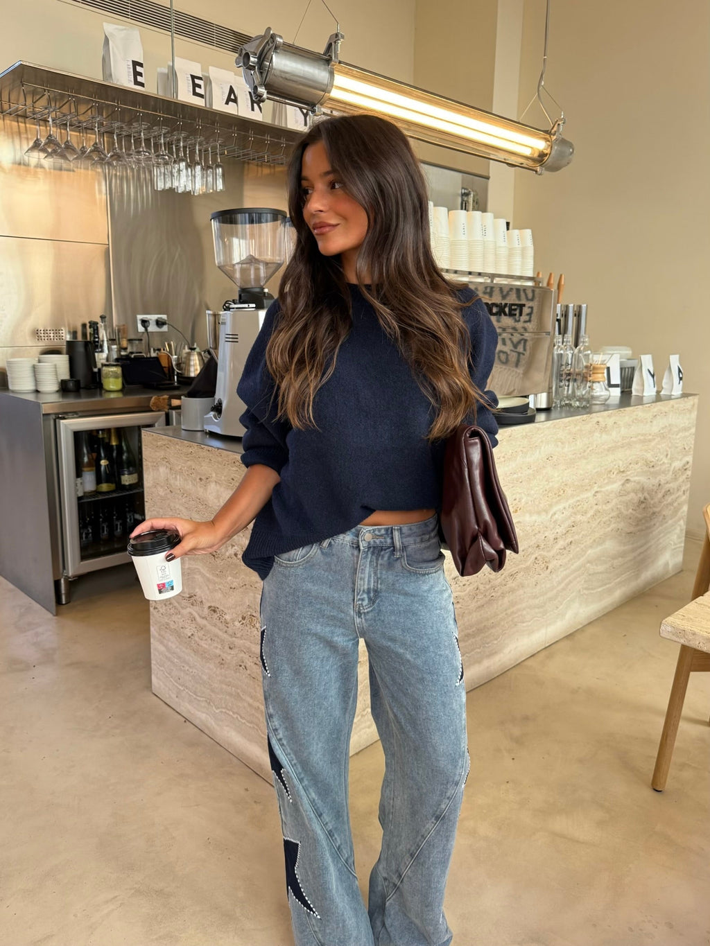 Jeans con stelle ricamate