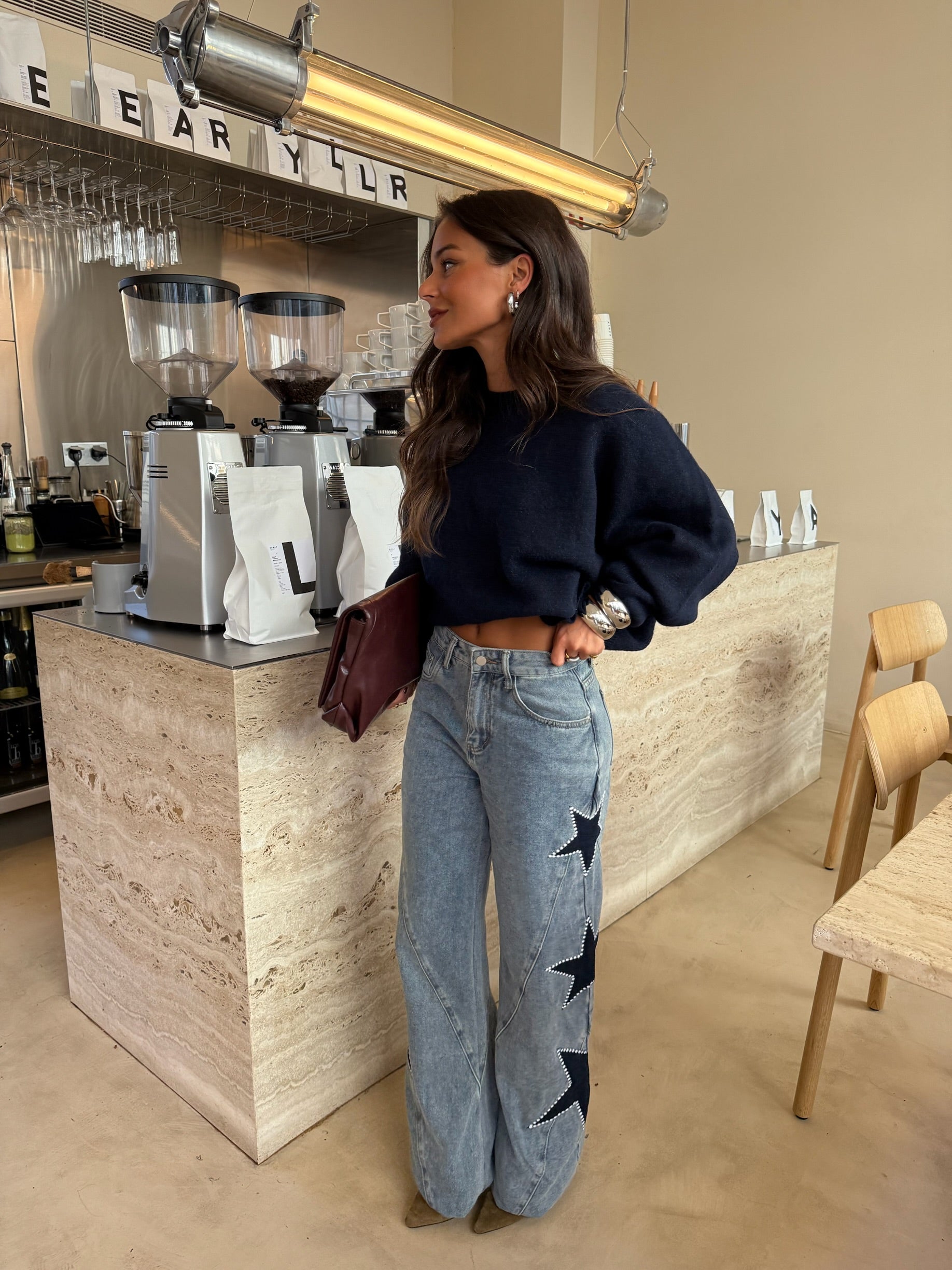 Jeans con stelle ricamate
