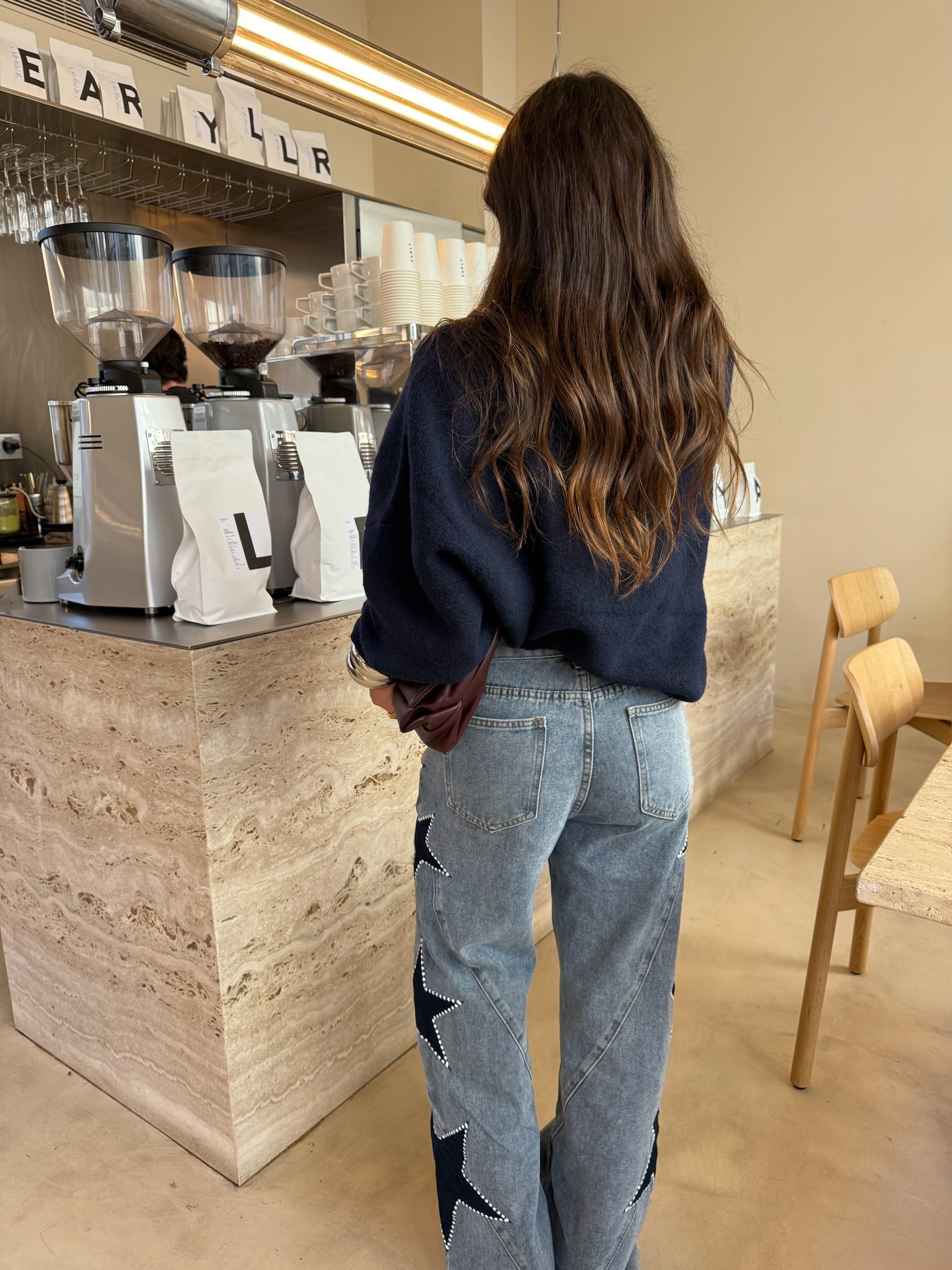 Jeans con stelle ricamate