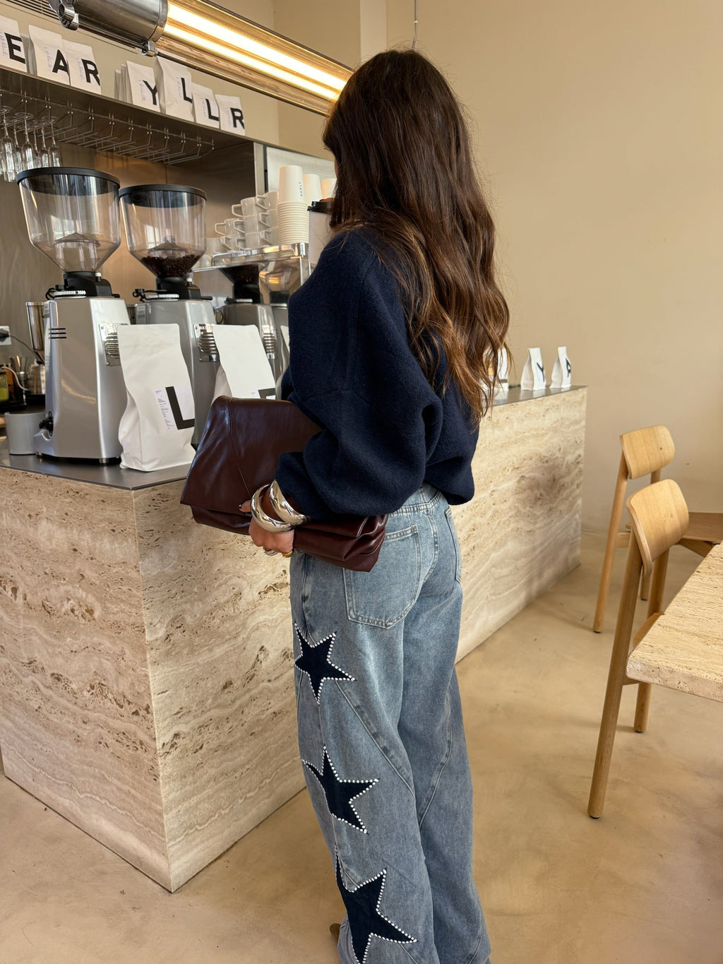 Jeans con stelle ricamate