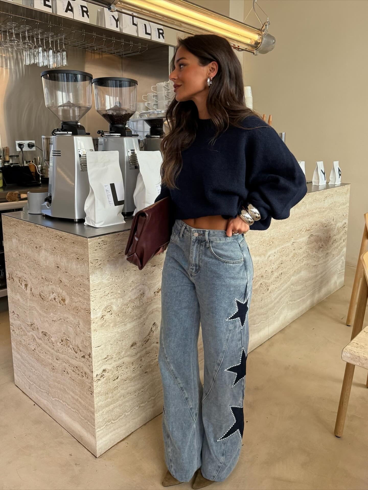 Jeans con stelle ricamate