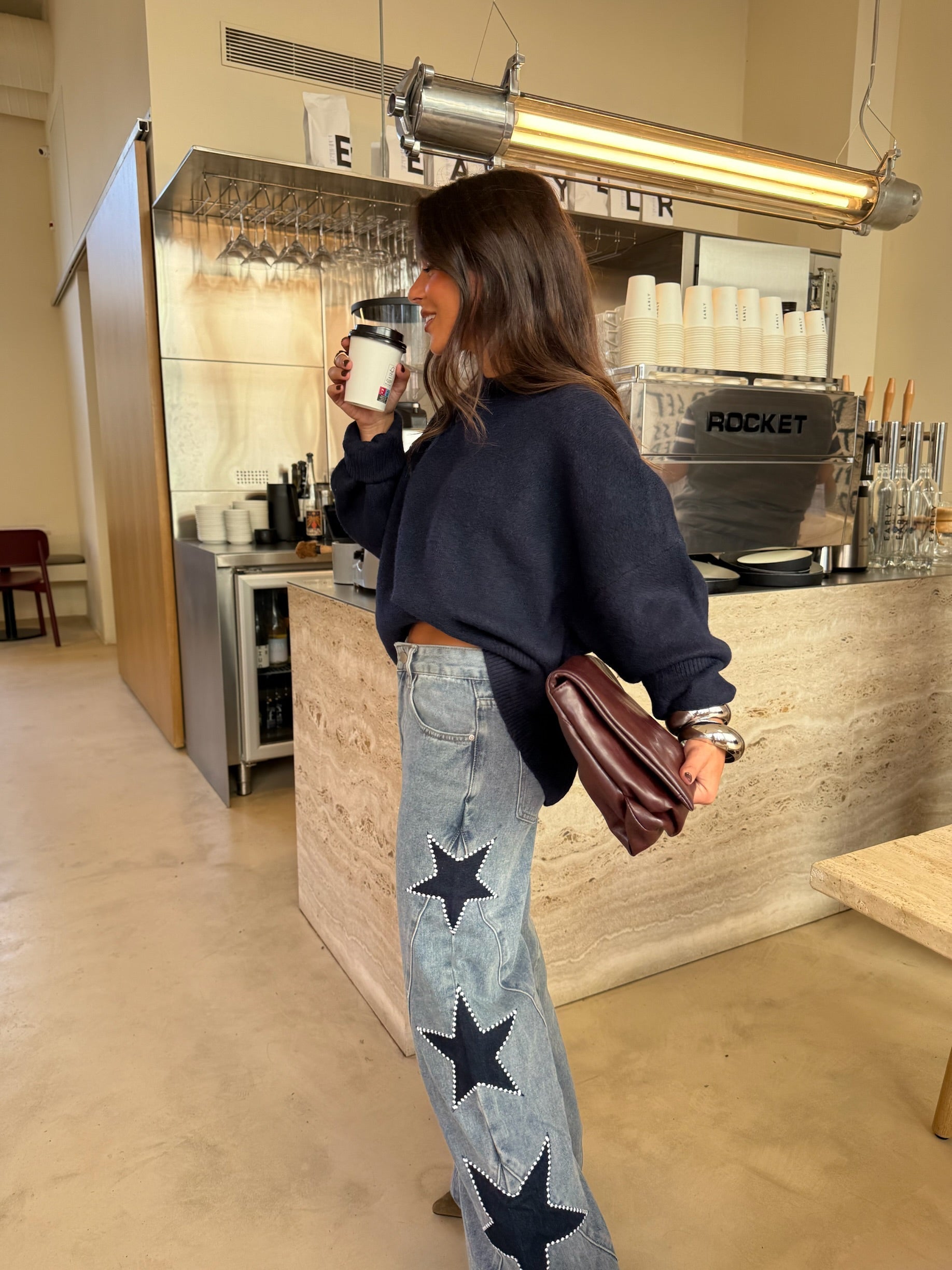 Jeans con stelle ricamate