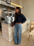 velmara-gen · pantaloni larghi con occhielli metallici · unico · frontale · 1