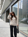 velmara-gen · maglione-lavorato-a-maglia-con-motivo-a pois · Cachi · frontale · 1